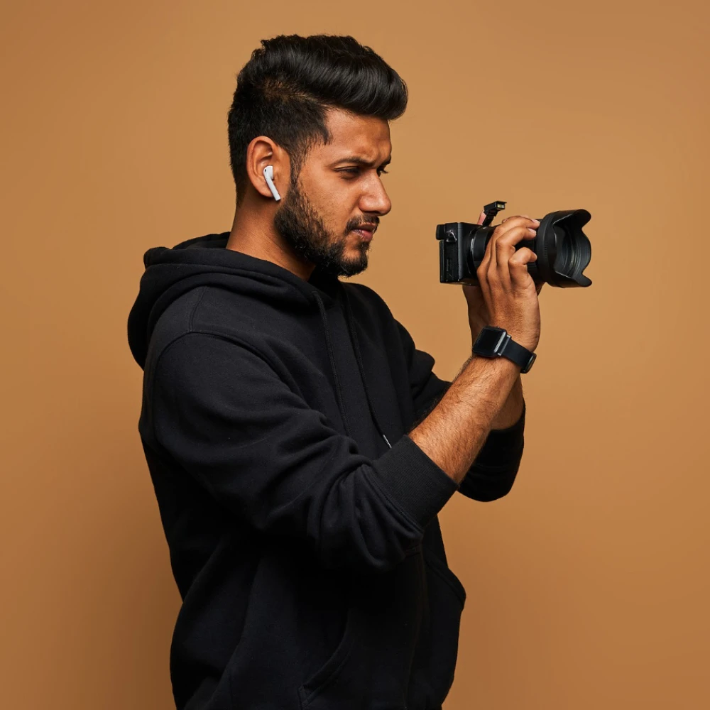 Professional videographer shooting content for brand storytelling and audience engagement